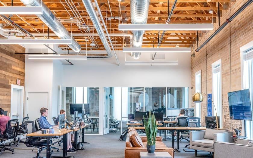 Open-plan office with people at workstations